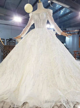 Check Out Entire Collection Tulle Sequins Long Sleeve Open Back Beading Wedding Dress